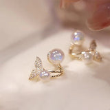 Pearlescent Tails | Voeg een vleugje oceanische glamour toe aan je look met deze oorbellen!