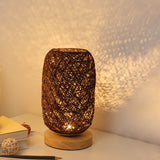 Kleine LED-tafellamp met houten voet en USB-oplaadfunctie