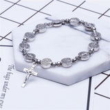 Gouden en zilveren Christelijk kruisarmband – Solana