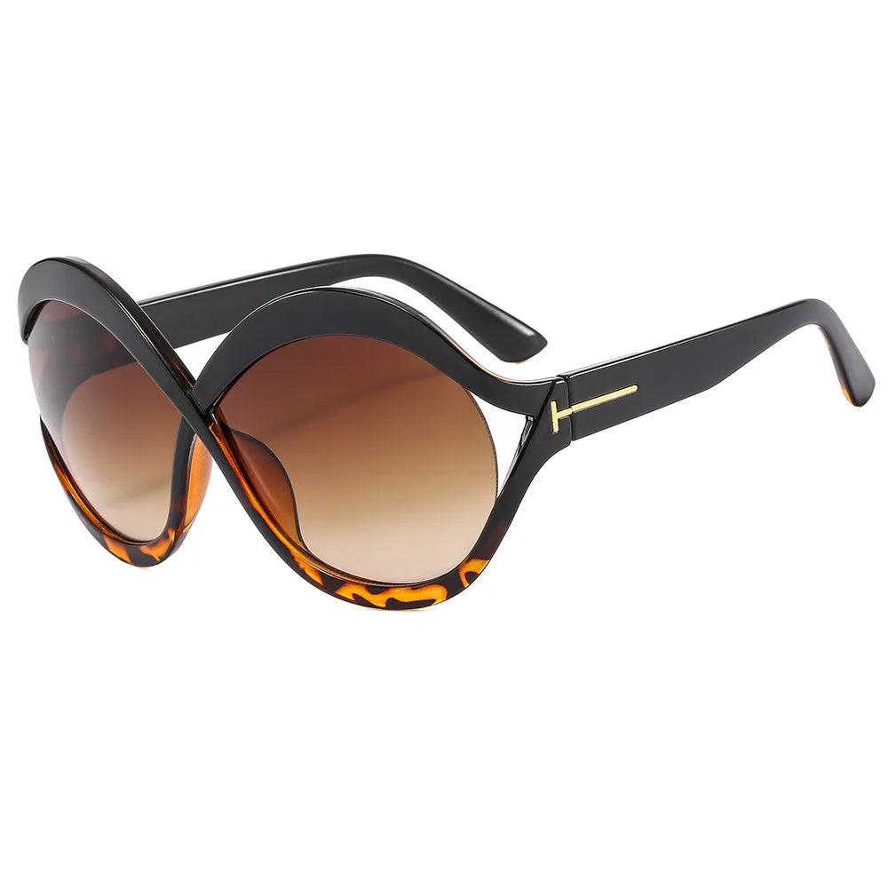 Elegante Ronde Oversized Zonnebril – Licht en Beschermend