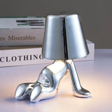 Designer LED tafellamp zittende man met glanzende afwerking