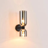 Elegante wandlamp met rookglas en gouden afwerking – dubbele lichtbron