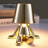 Designer LED tafellamp zittende man met glanzende afwerking