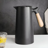 VetroLux – Elegante Dubbelwandige Glazen Karaf met Houten Handvat voor Heet en Koud Drankjes
