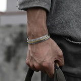 Vogel | Vintage-geïnspireerde verenarmband in edgy punkstijl
