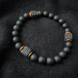Matzwarte Onyx- en Kubus-Lavasteen-Balance-Armband – Aurelia