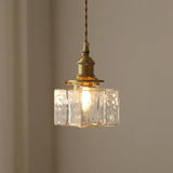 Vintage hanglampen van glas met messing afwerking