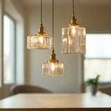 Vintage hanglampen van glas met messing afwerking