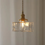 Vintage hanglampen van glas met messing afwerking
