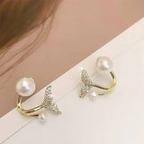 Pearlescent Tails | Voeg een vleugje oceanische glamour toe aan je look met deze oorbellen!