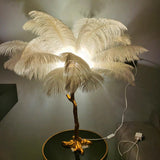 Hoge lamp met veren die luxe in elk interieur brengt!