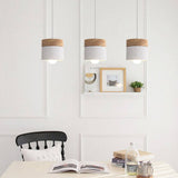 Robinson Hanglamp – Speelse Elegantie met Natuurhout & Zachte Tinten