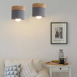 Robinson Hanglamp – Speelse Elegantie met Natuurhout & Zachte Tinten