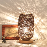 Kleine LED-tafellamp met houten voet en USB-oplaadfunctie
