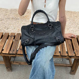 Astrid - Casual handtas met meerdere ritsen en schouderband