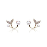 Pearlescent Tails | Voeg een vleugje oceanische glamour toe aan je look met deze oorbellen!