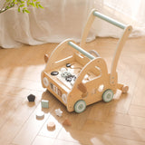 Houten loopwagen met Montessori-speelstukken en spiegels