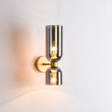 Elegante wandlamp met rookglas en gouden afwerking – dubbele lichtbron