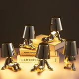 Designer LED tafellamp zittende man met glanzende afwerking