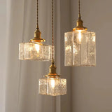 Vintage hanglampen van glas met messing afwerking