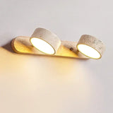 Moderne LED wandlamp met draaibare kappen van steen en een houten basis