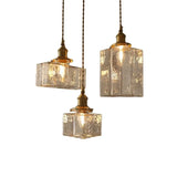 Vintage hanglampen van glas met messing afwerking