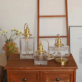 Vintage hanglampen van glas met messing afwerking