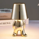 Designer LED tafellamp zittende man met glanzende afwerking