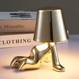 Designer LED tafellamp zittende man met glanzende afwerking