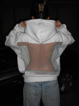 BackStageGlow | Wanneer de lichten aangaan, schittert deze hoodie niet alleen, maar domineert hij de ruimte