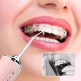 AquaFloss | Zeg vaarwel tegen tandsteen en plakopbouw met deze waterflosser!