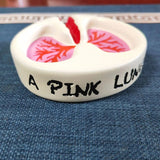 AshLobe | Een creatieve asbak die een subtiele gezondheidsherinnering geeft!
