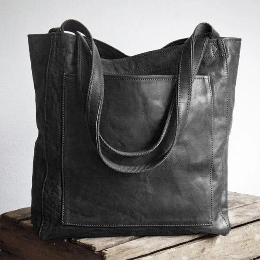 Elegante Leren Tas met Luxe en Vlekbestendige Binnenkant