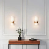 Elegante wandlamp met rookglas en gouden afwerking – dubbele lichtbron