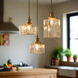Vintage hanglampen van glas met messing afwerking