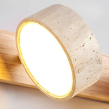 Moderne LED wandlamp met draaibare kappen van steen en een houten basis